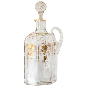 ANTIQUE GLASS AND GOLD DECANTER WITH GRAPES