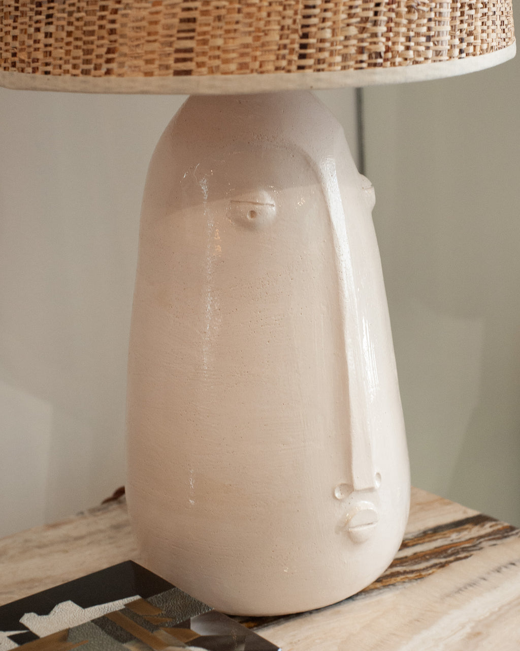 MID CENTURY CERAMIC ABSTRACTED FACES LAMPS WITH NATURAL WOVEN SHADES
