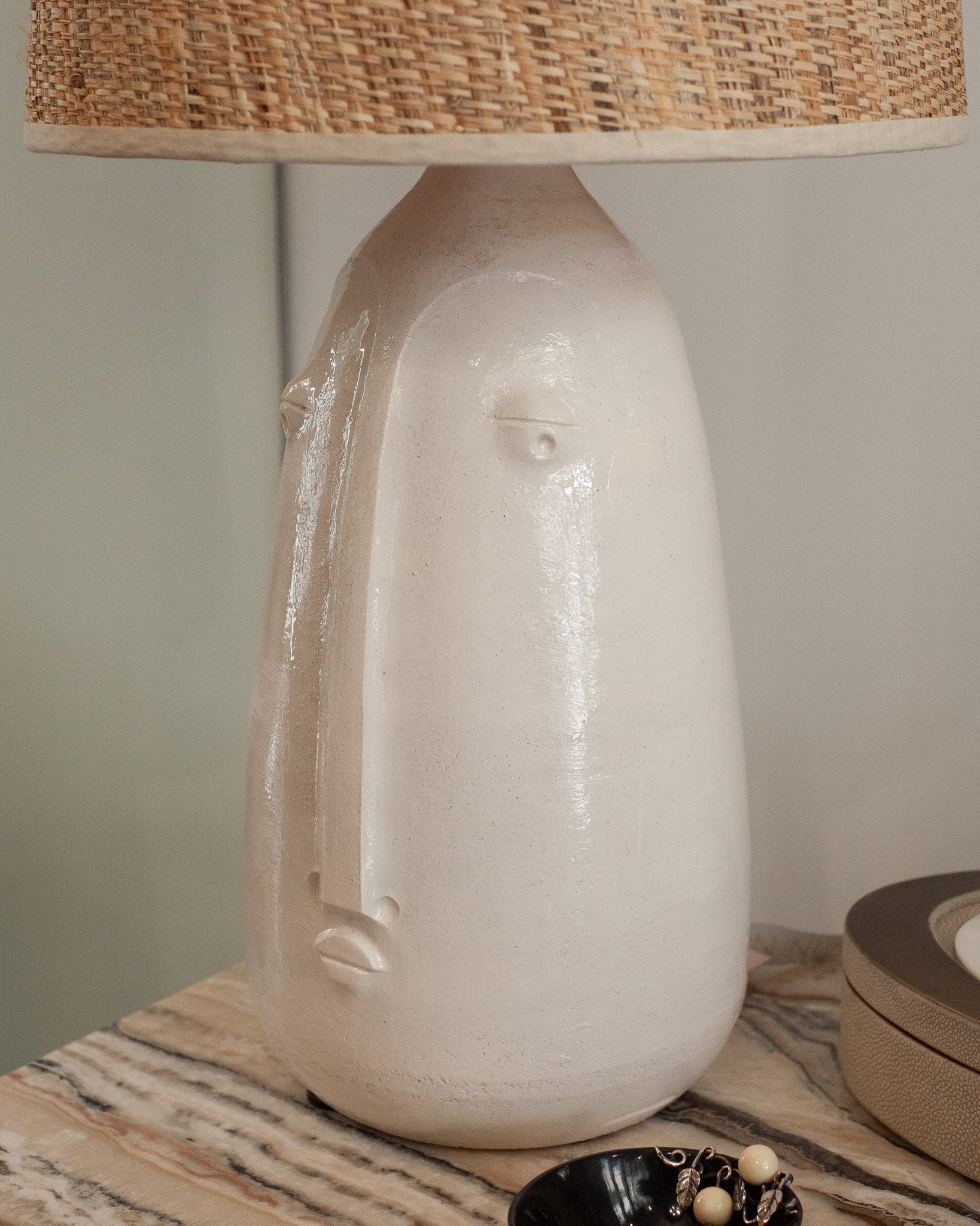 MID CENTURY CERAMIC ABSTRACTED FACES LAMPS WITH NATURAL WOVEN SHADES