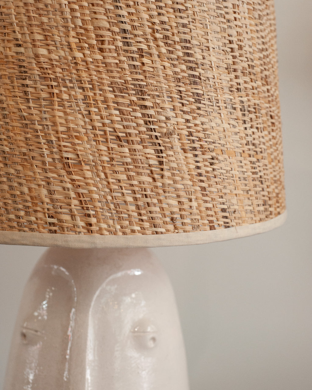 MID CENTURY CERAMIC ABSTRACTED FACES LAMPS WITH NATURAL WOVEN SHADES