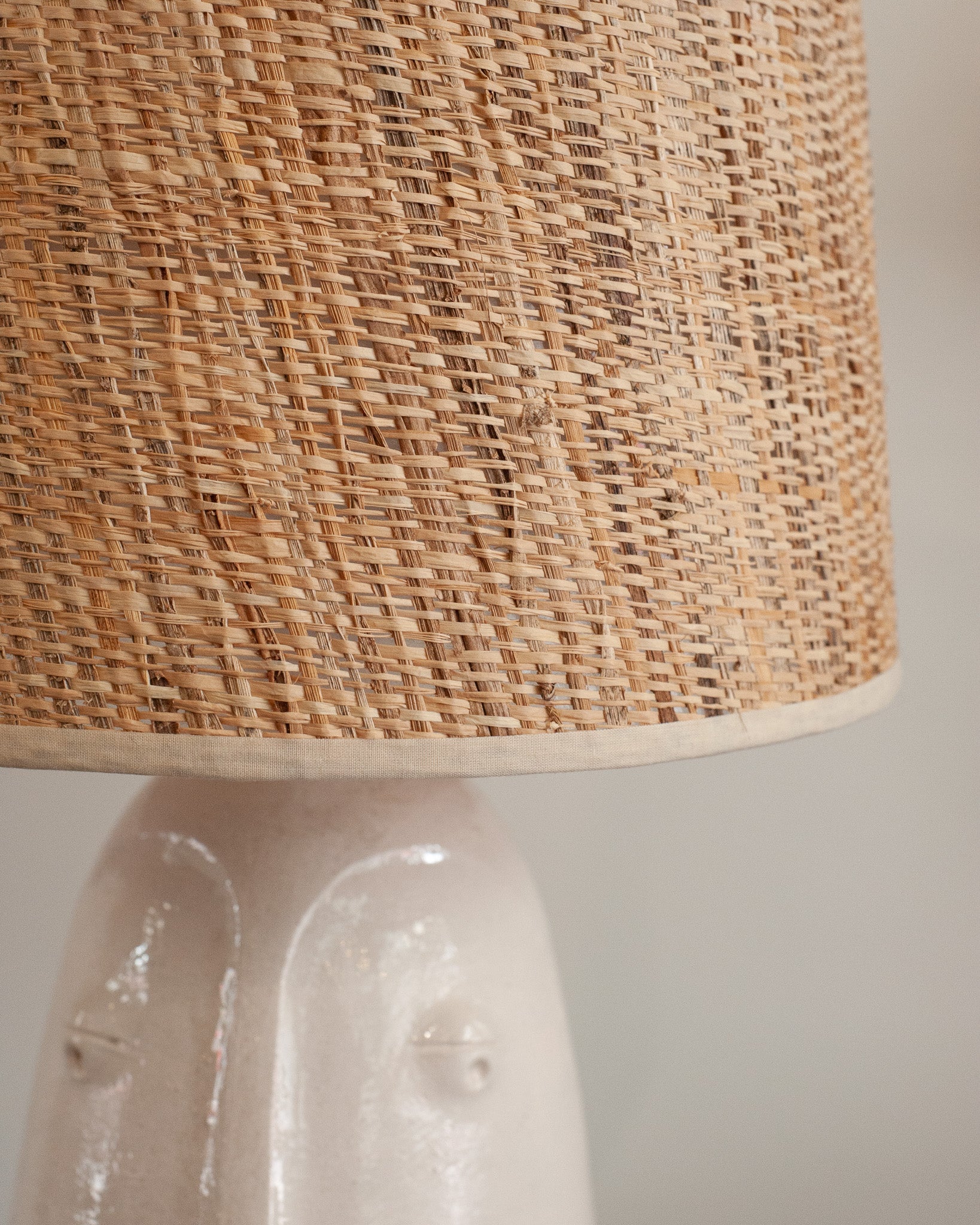 MID CENTURY CERAMIC ABSTRACTED FACES LAMPS WITH NATURAL WOVEN SHADES
