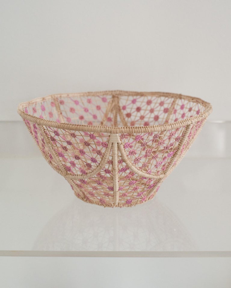 CONTEMPORARY ROUND HANDWOVEN RATTAN BOWL WITH SOFT PINK KNOTS