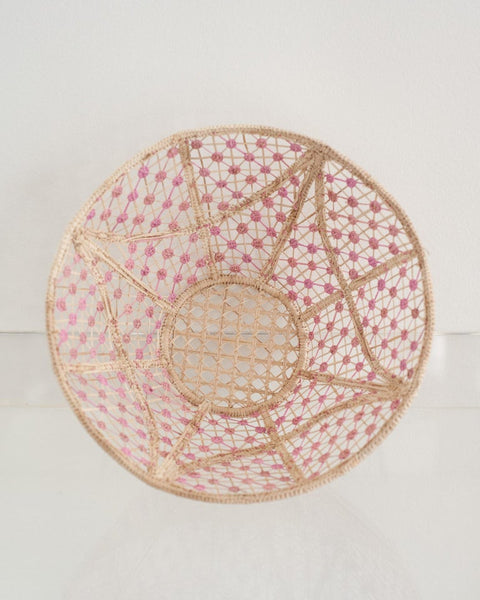 CONTEMPORARY ROUND HANDWOVEN RATTAN BOWL WITH SOFT PINK KNOTS