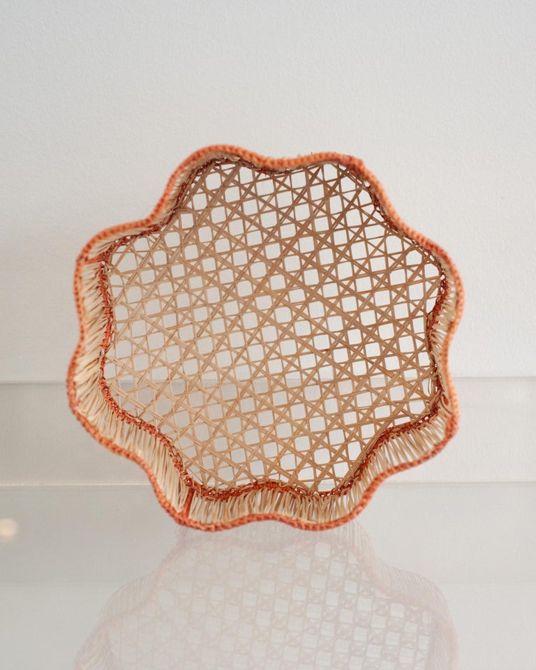 CONTEMPORARY ROUND WAVY WOVEN RATTAN BOWL / BASKET IN CORAL