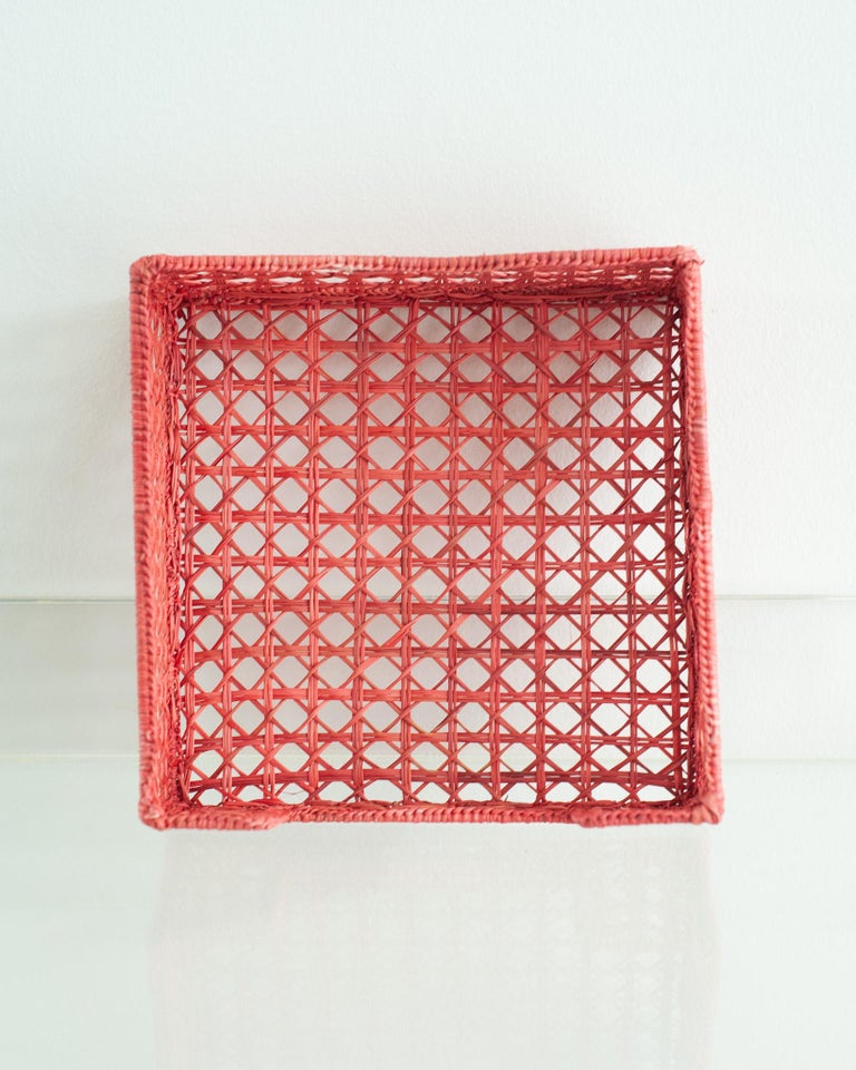 CONTEMPORARY WOVEN RATTAN NAPKIN HOLDER IN CORAL