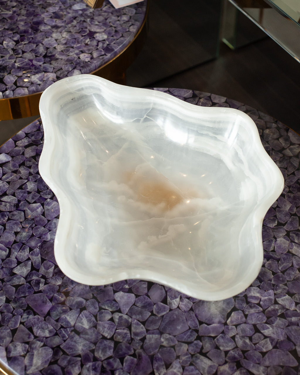 CONTEMPORARY FREEFORM HAND CARVED BANDED ONYX BOWL