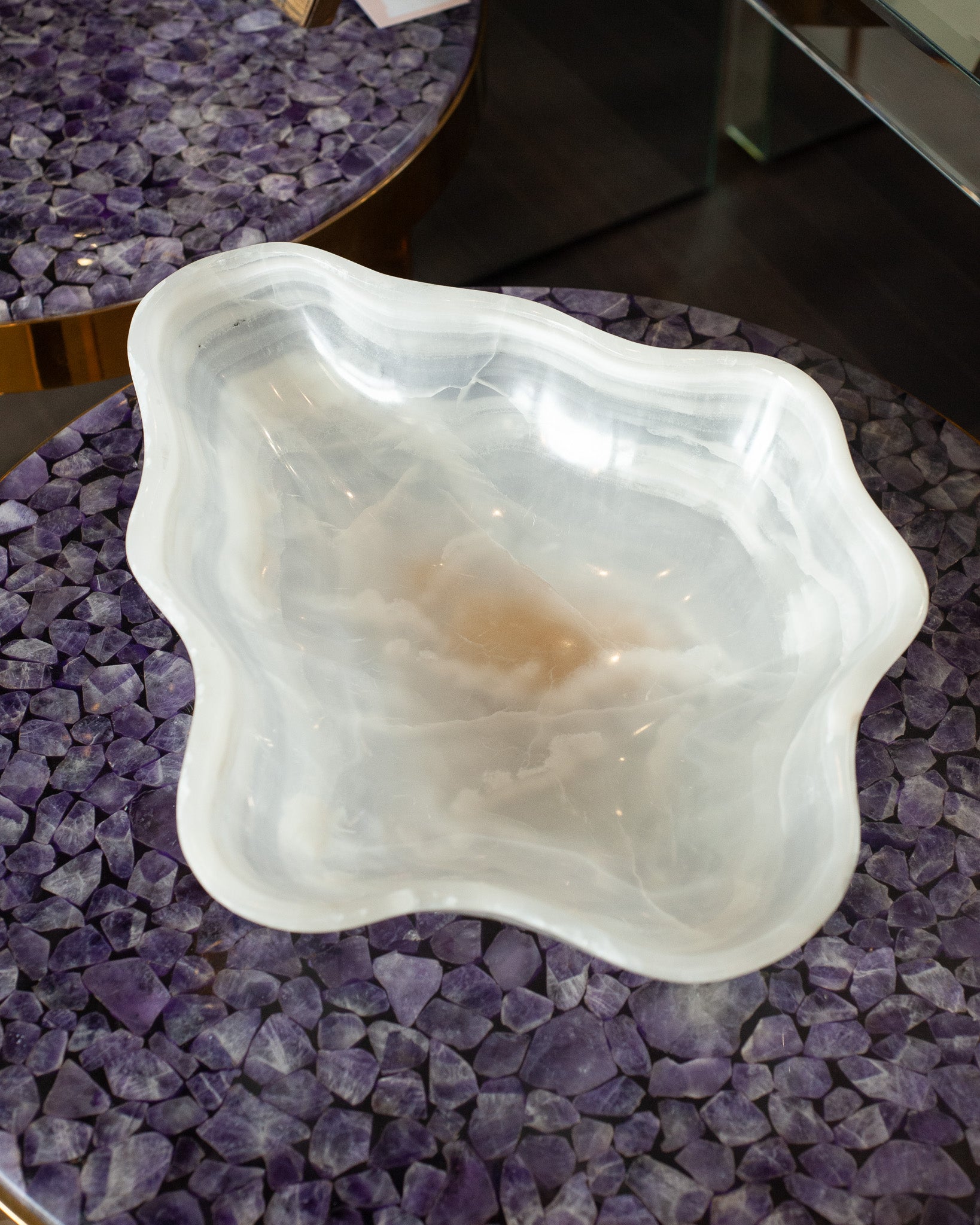 CONTEMPORARY FREEFORM HAND CARVED BANDED ONYX BOWL