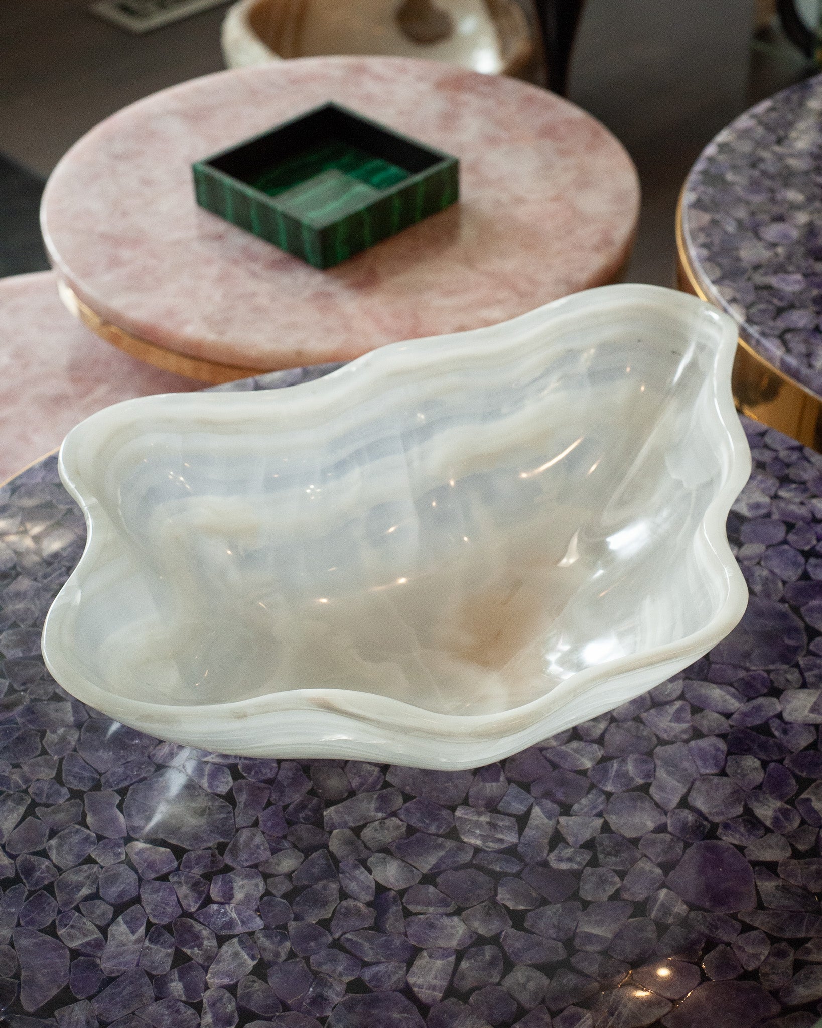 CONTEMPORARY FREEFORM HAND CARVED BANDED ONYX BOWL