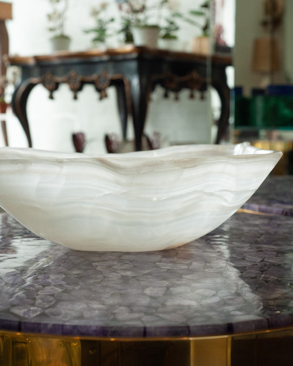 CONTEMPORARY FREEFORM HAND CARVED BANDED ONYX BOWL