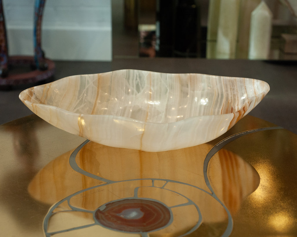 CONTEMPORARY FREEFORM HAND CARVED BANDED ONYX BOWL WITH GOLDEN STRIPES