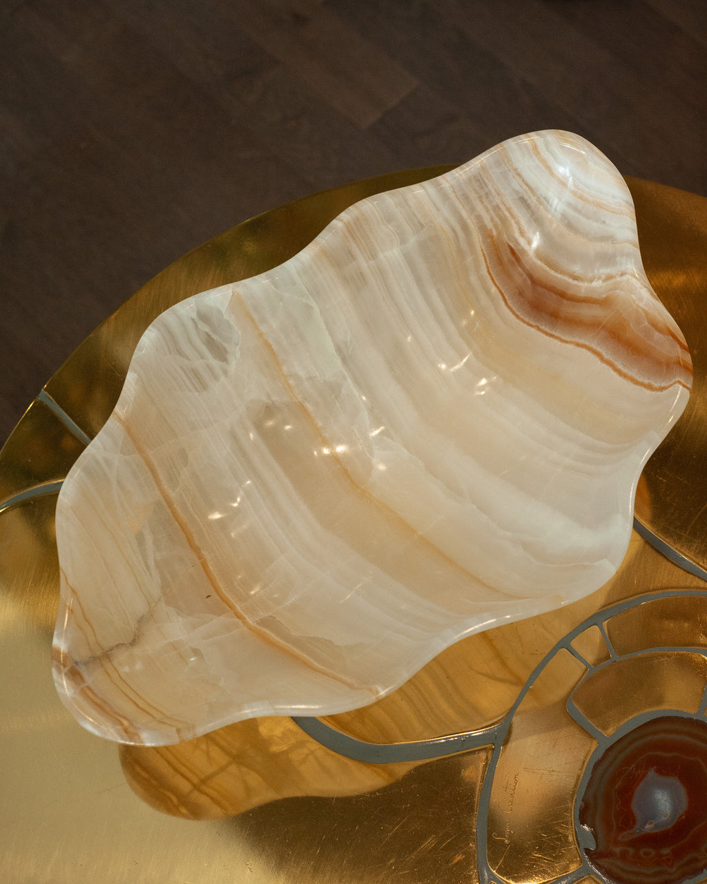 CONTEMPORARY FREEFORM HAND CARVED BANDED ONYX BOWL WITH GOLDEN STRIPES