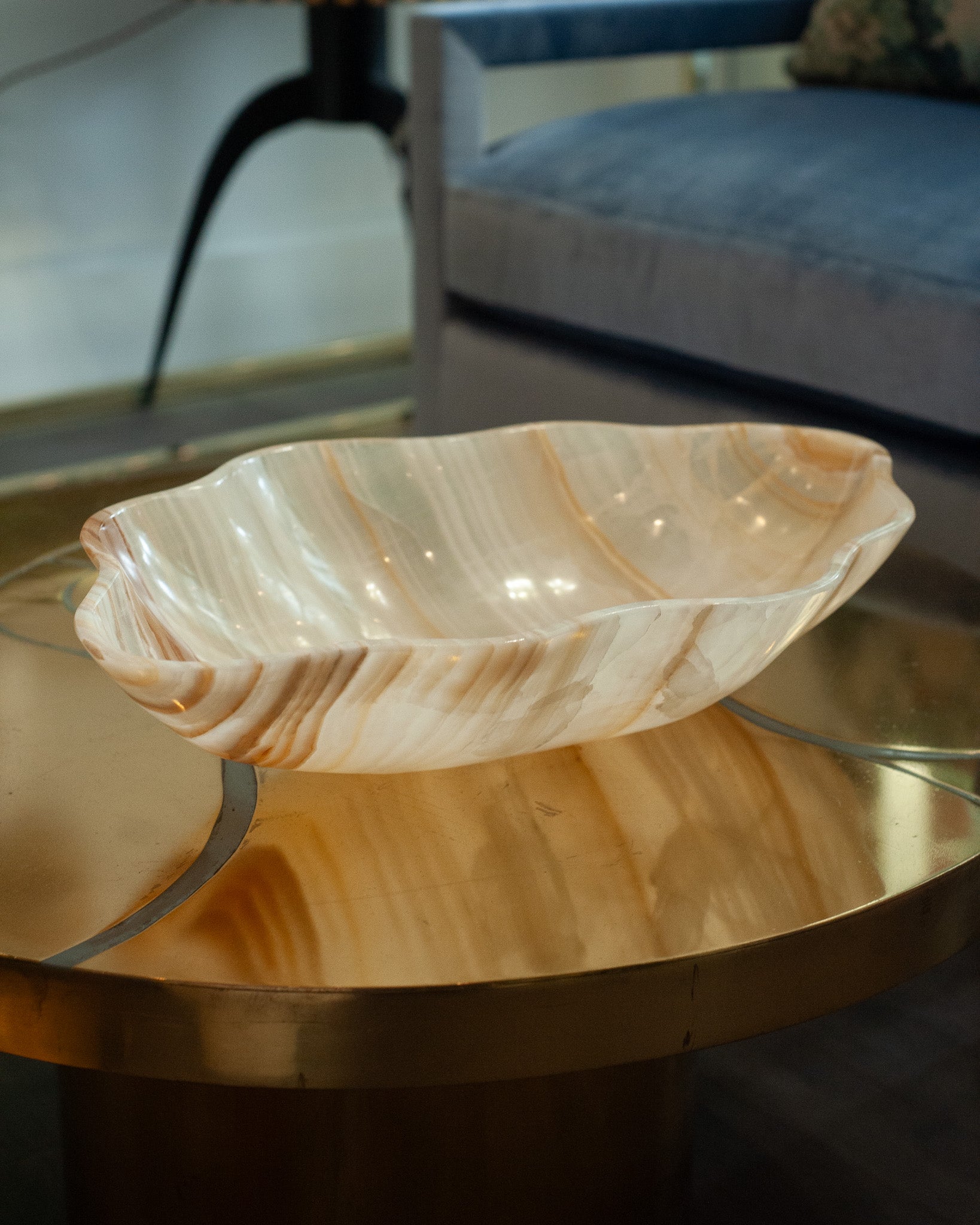 CONTEMPORARY FREEFORM HAND CARVED BANDED ONYX BOWL WITH GOLDEN STRIPES