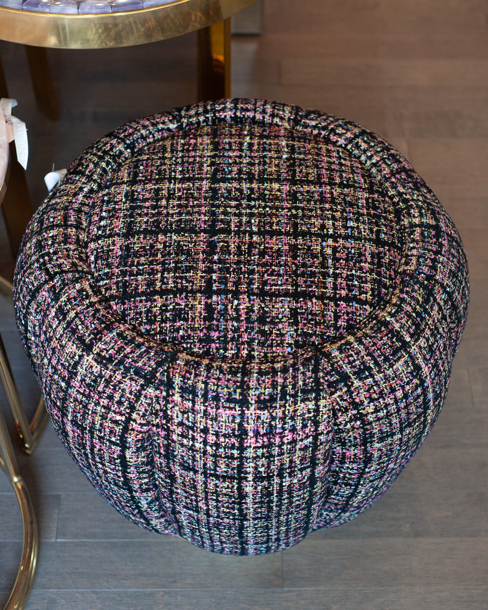 STUDIO MAISON NURITA MELON OTTOMAN IN BLACK TWEED WITH BRUSHED GOLD METAL BASE