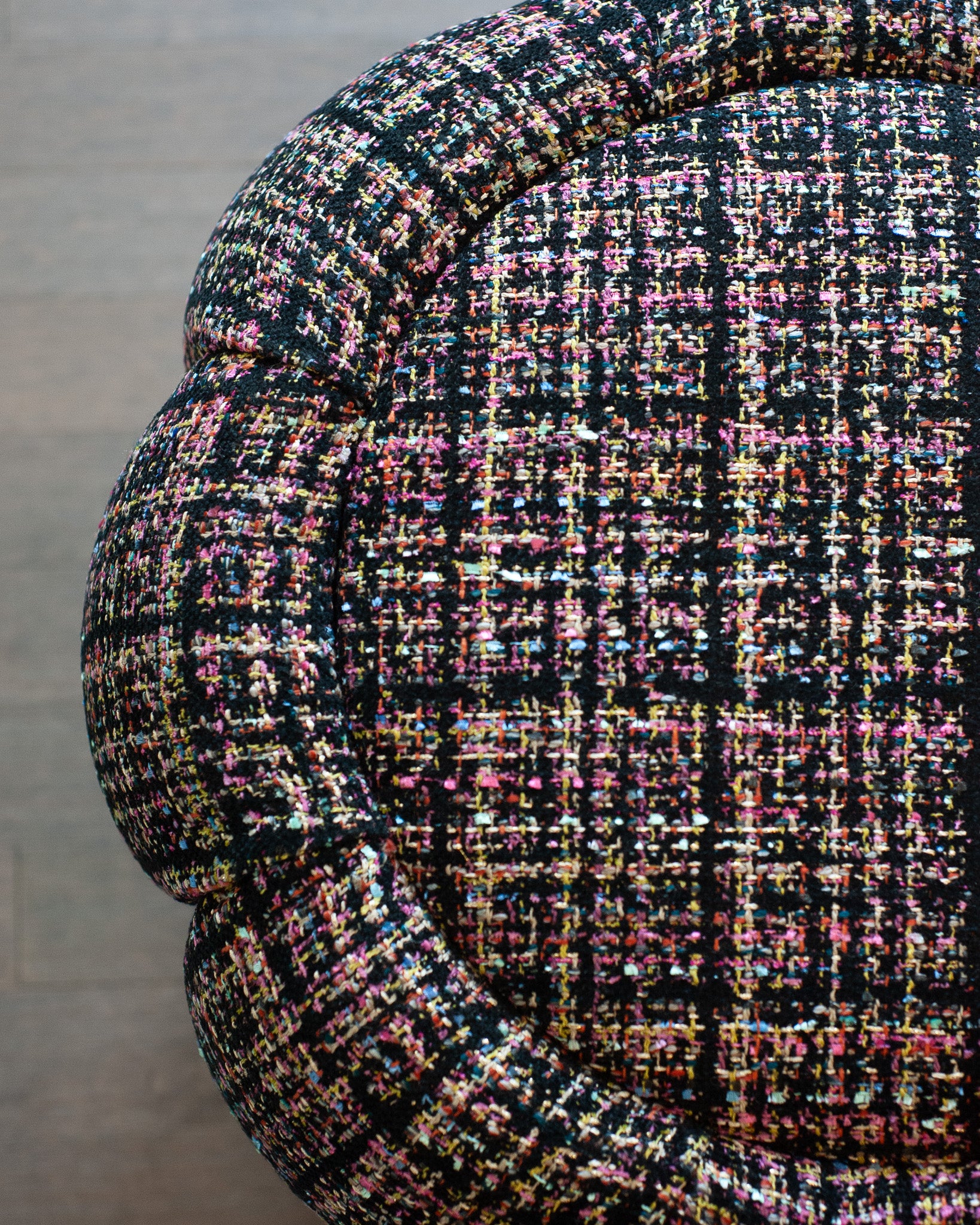 STUDIO MAISON NURITA MELON OTTOMAN IN BLACK TWEED WITH BRUSHED GOLD METAL BASE