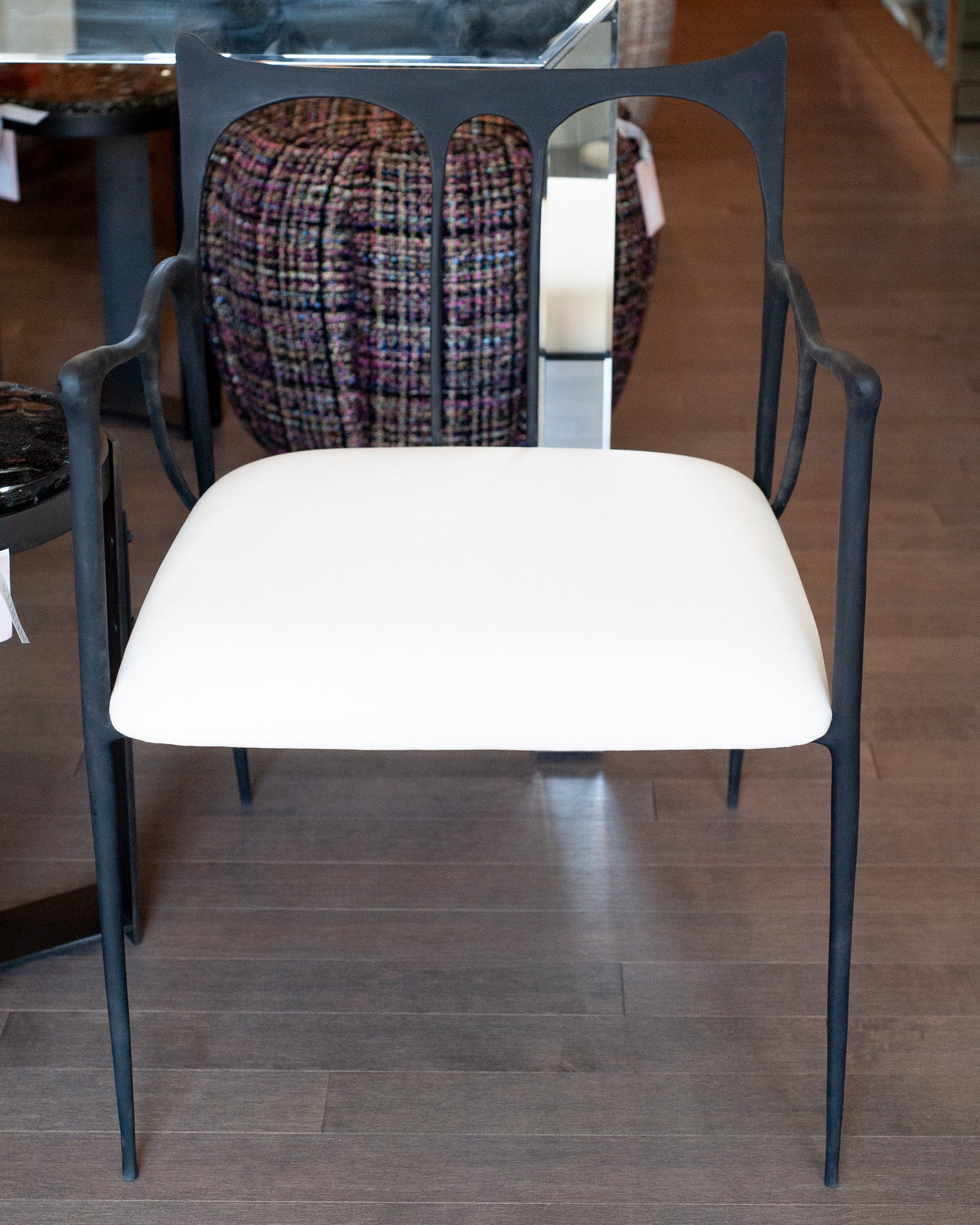 CONTEMPORARY BLACKENED CAST BRASS SCULPTURAL ARMCHAIR WITH CALICO SEAT