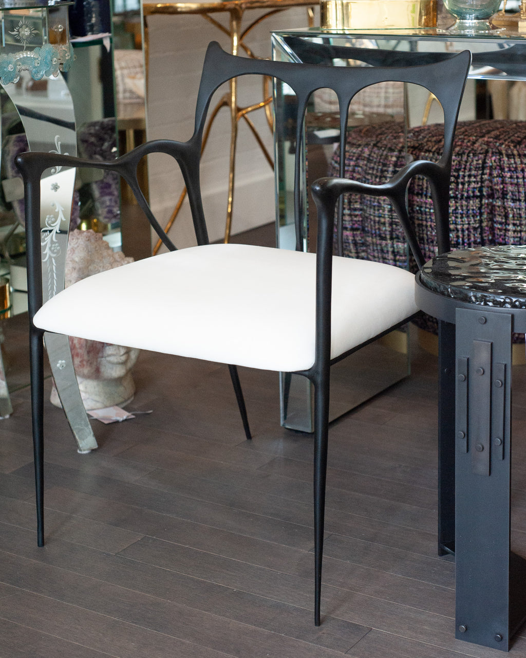 CONTEMPORARY BLACKENED CAST BRASS SCULPTURAL ARMCHAIR WITH CALICO SEAT