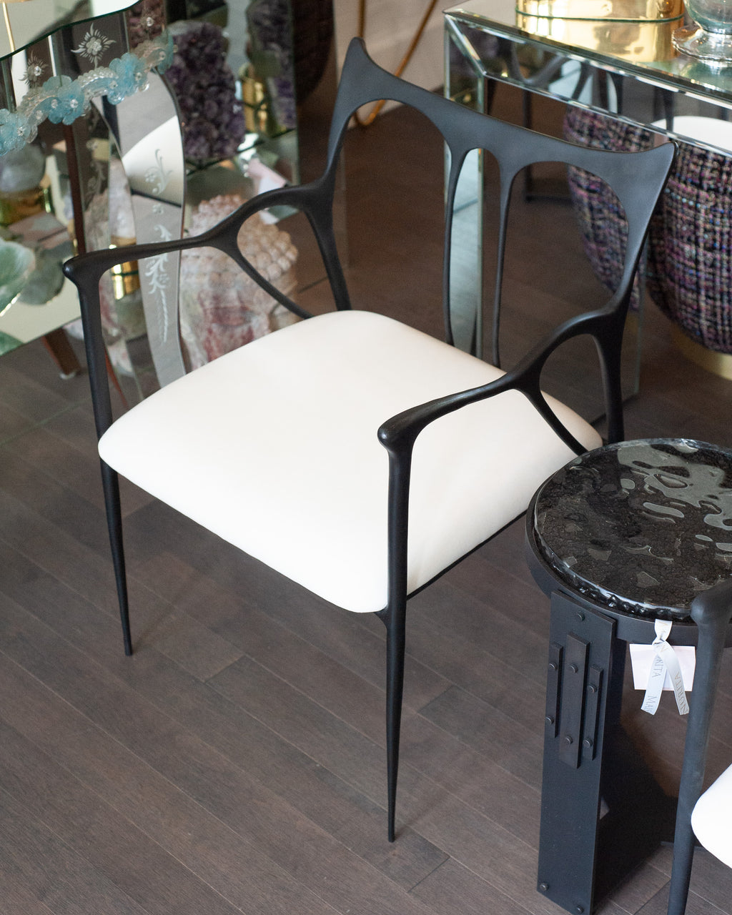 CONTEMPORARY BLACKENED CAST BRASS SCULPTURAL ARMCHAIR WITH CALICO SEAT