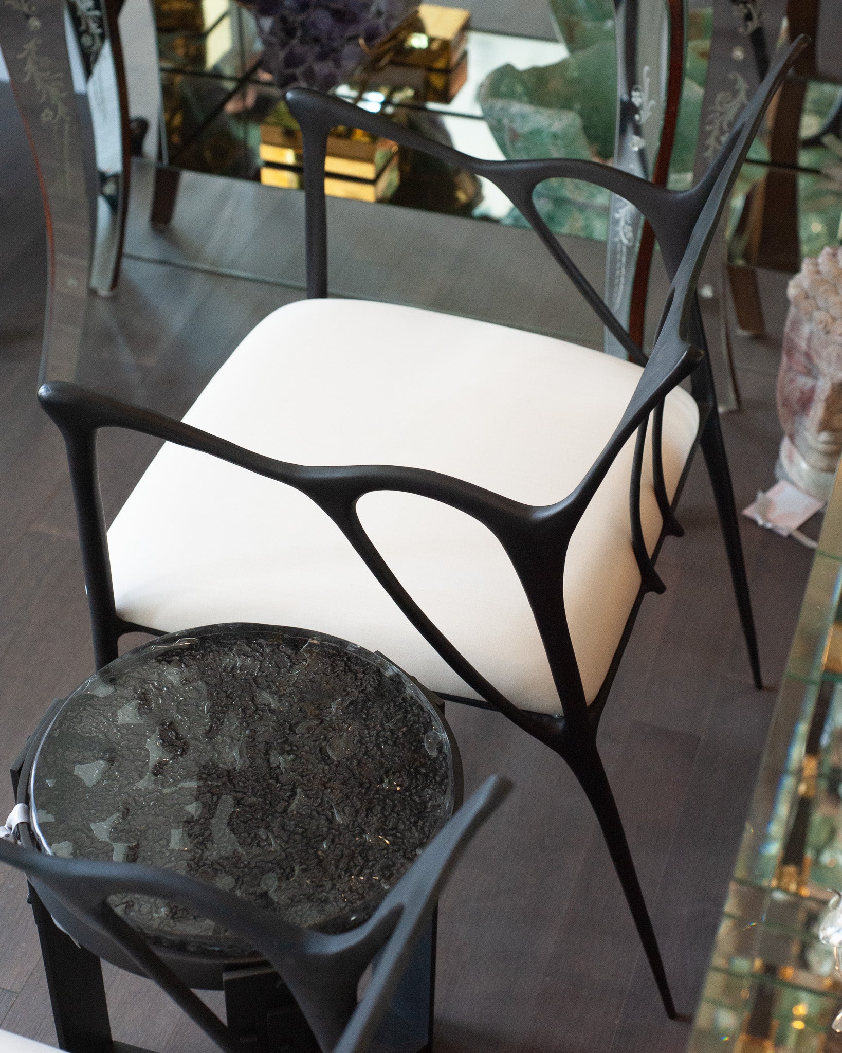 CONTEMPORARY BLACKENED CAST BRASS SCULPTURAL ARMCHAIR WITH CALICO SEAT