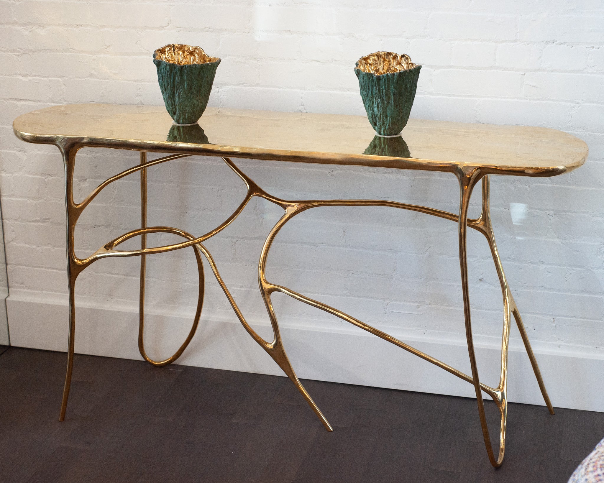 CONTEMPORARY POLISHED CAST BRASS SCULPTURAL CONSOLE TABLE