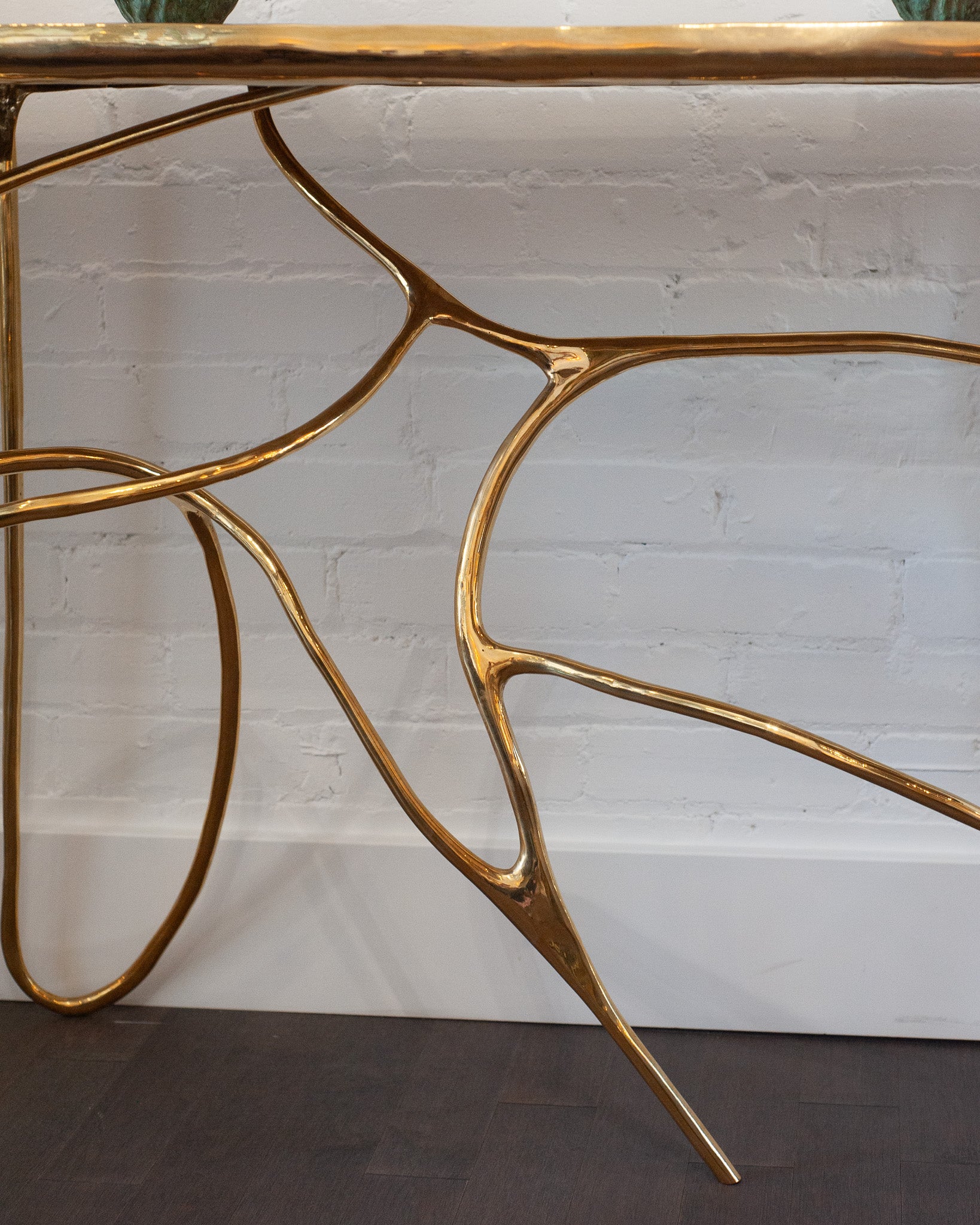 CONTEMPORARY POLISHED CAST BRASS SCULPTURAL CONSOLE TABLE