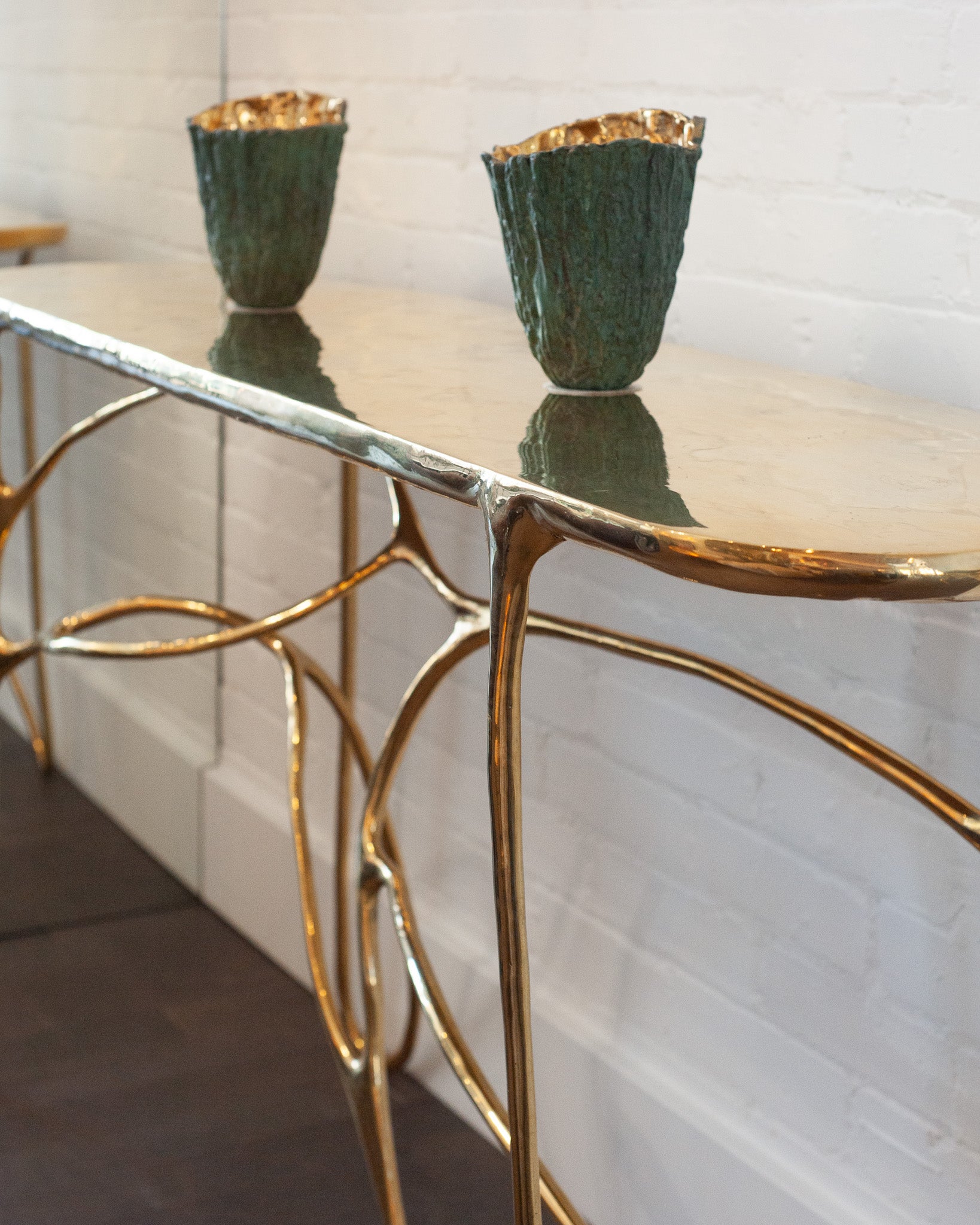 CONTEMPORARY POLISHED CAST BRASS SCULPTURAL CONSOLE TABLE