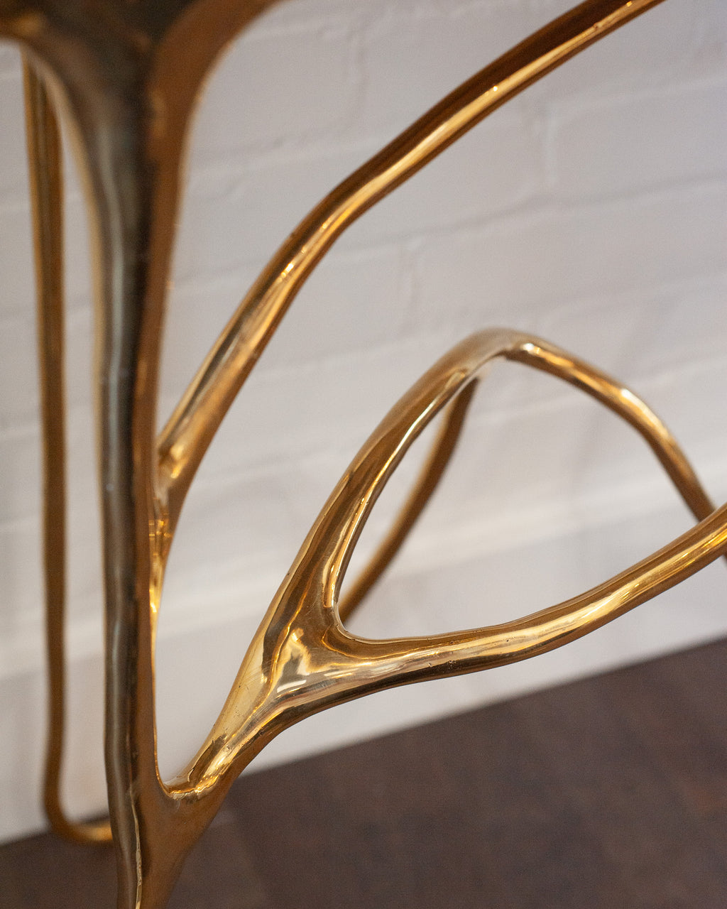CONTEMPORARY POLISHED CAST BRASS SCULPTURAL CONSOLE TABLE