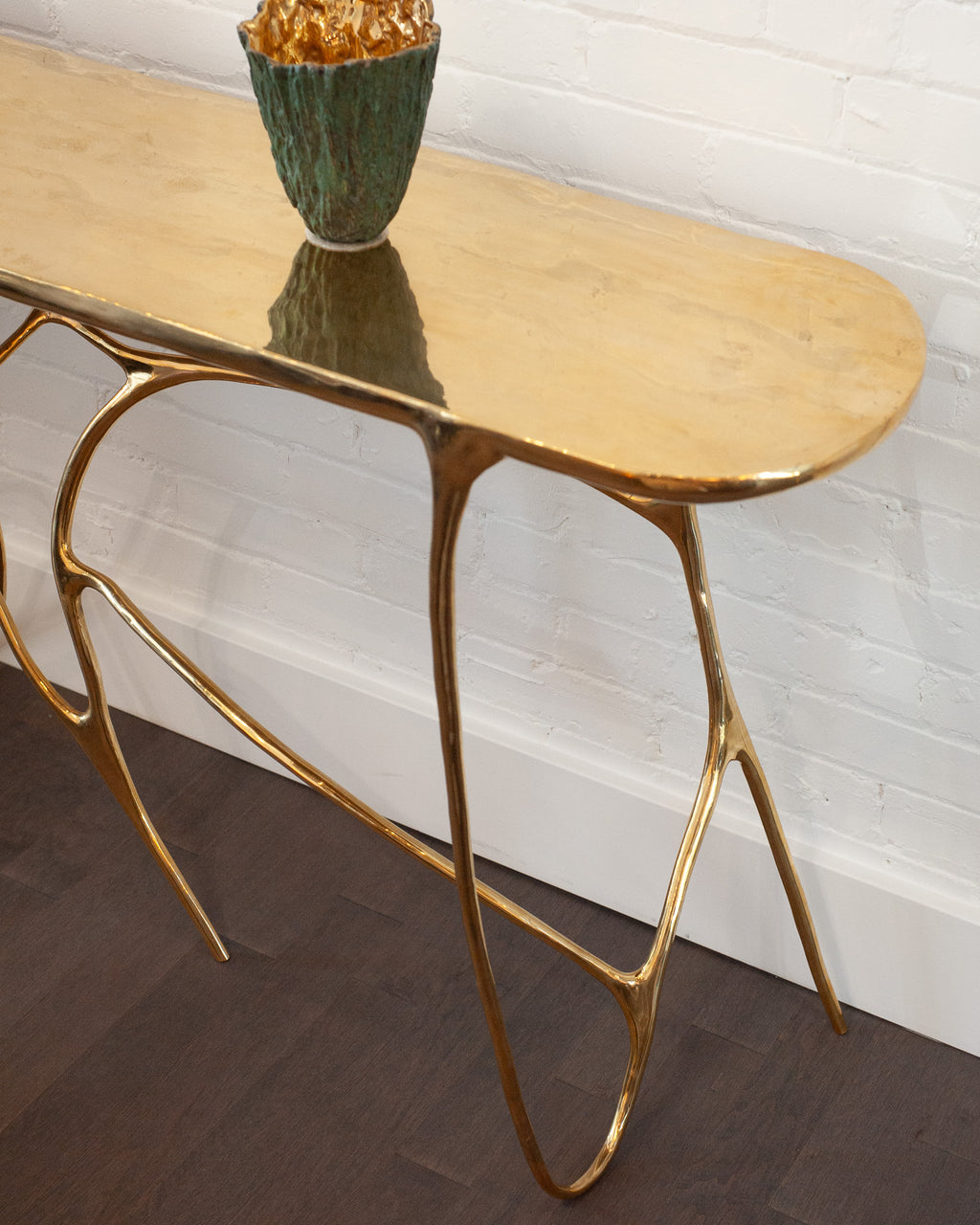 CONTEMPORARY POLISHED CAST BRASS SCULPTURAL CONSOLE TABLE