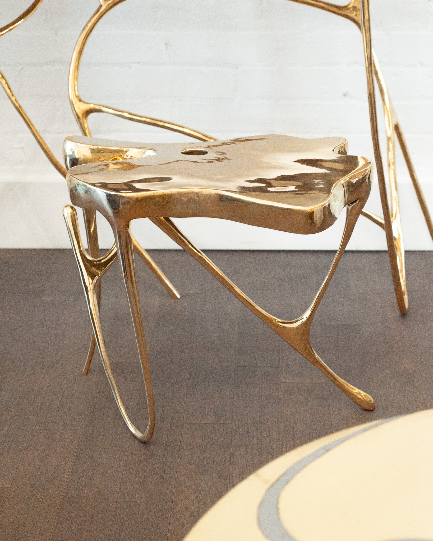CONTEMPORARY POLISHED CAST BRASS SCULPTURAL SIDE TABLE