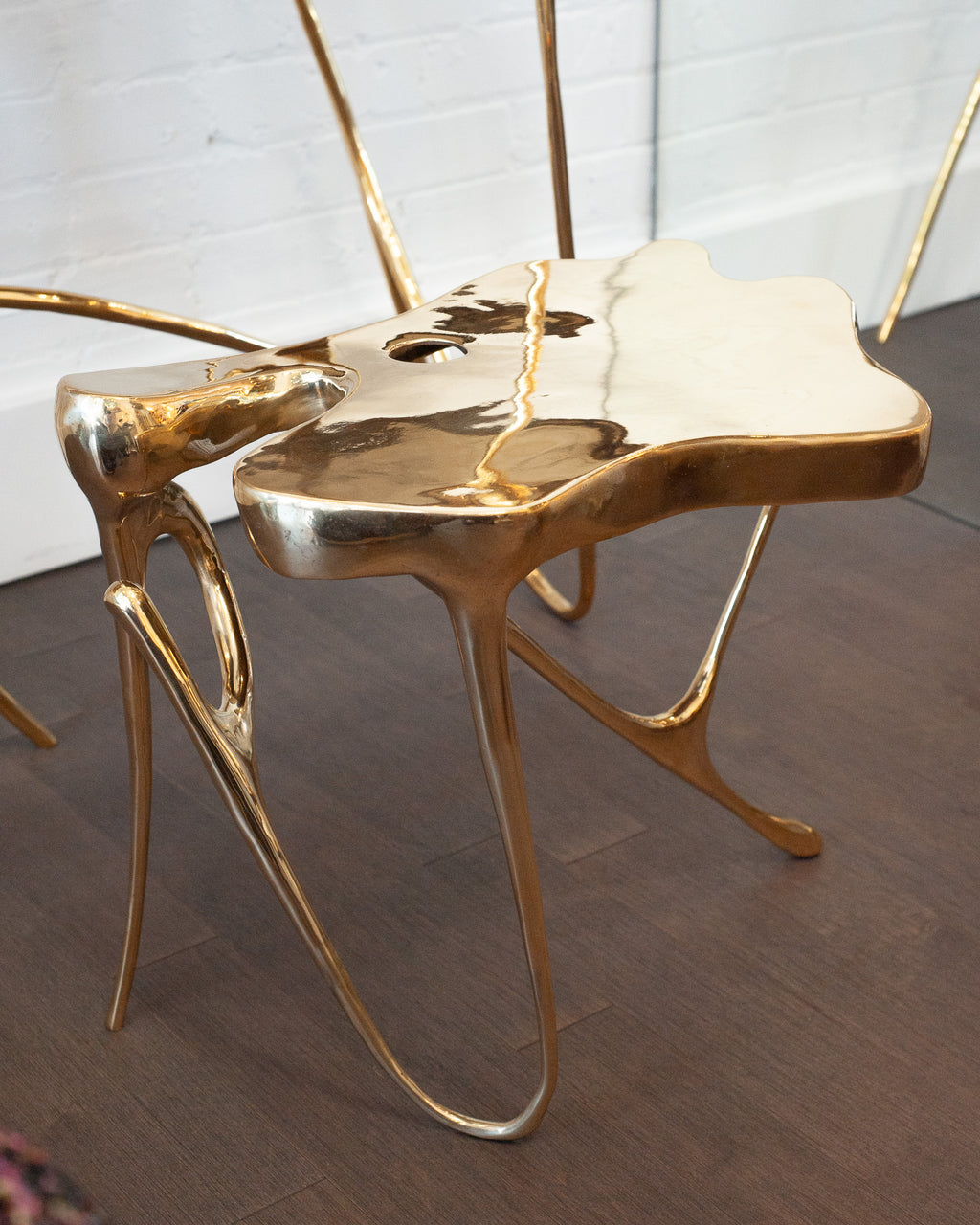 CONTEMPORARY POLISHED CAST BRASS SCULPTURAL SIDE TABLE