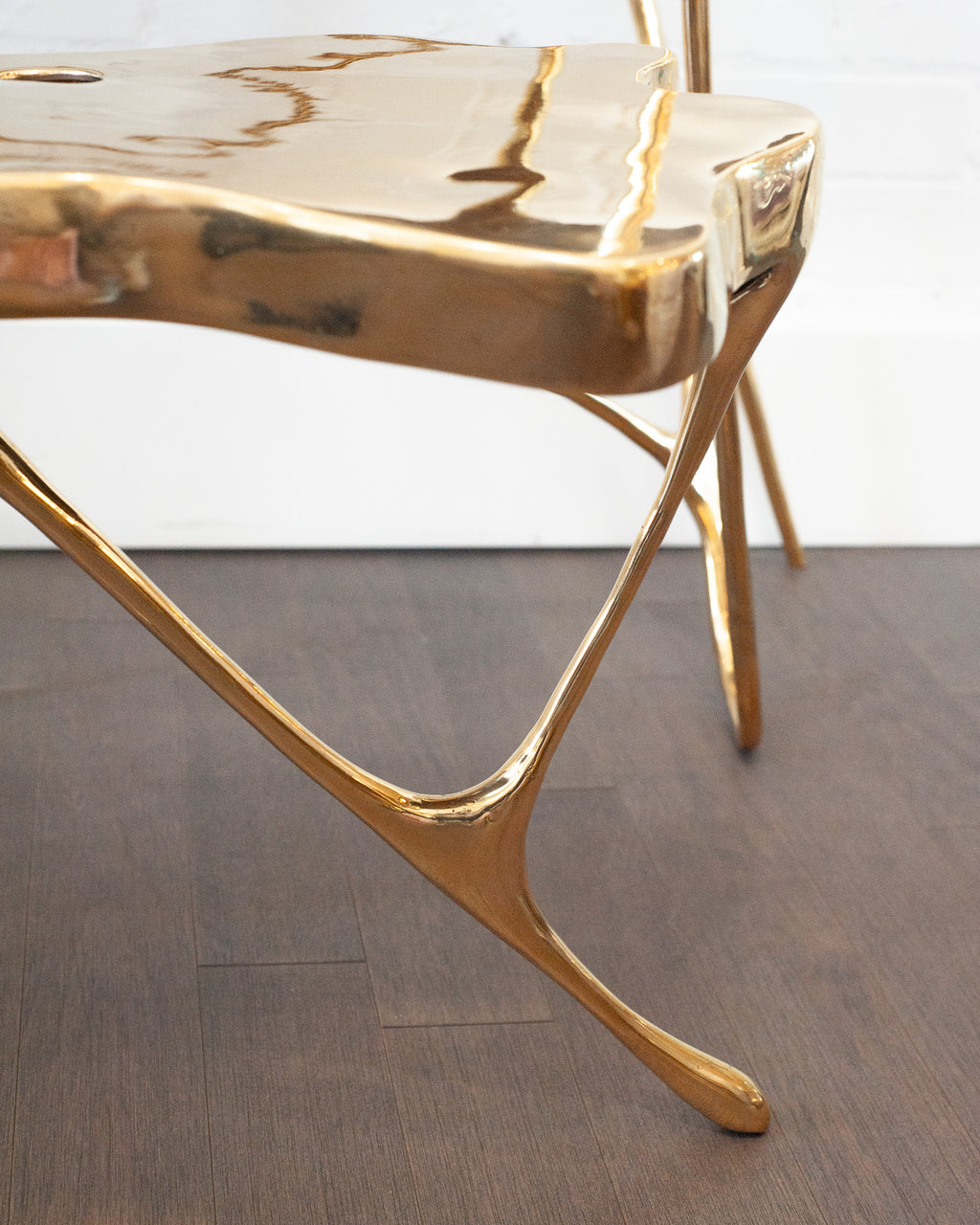 CONTEMPORARY POLISHED CAST BRASS SCULPTURAL SIDE TABLE