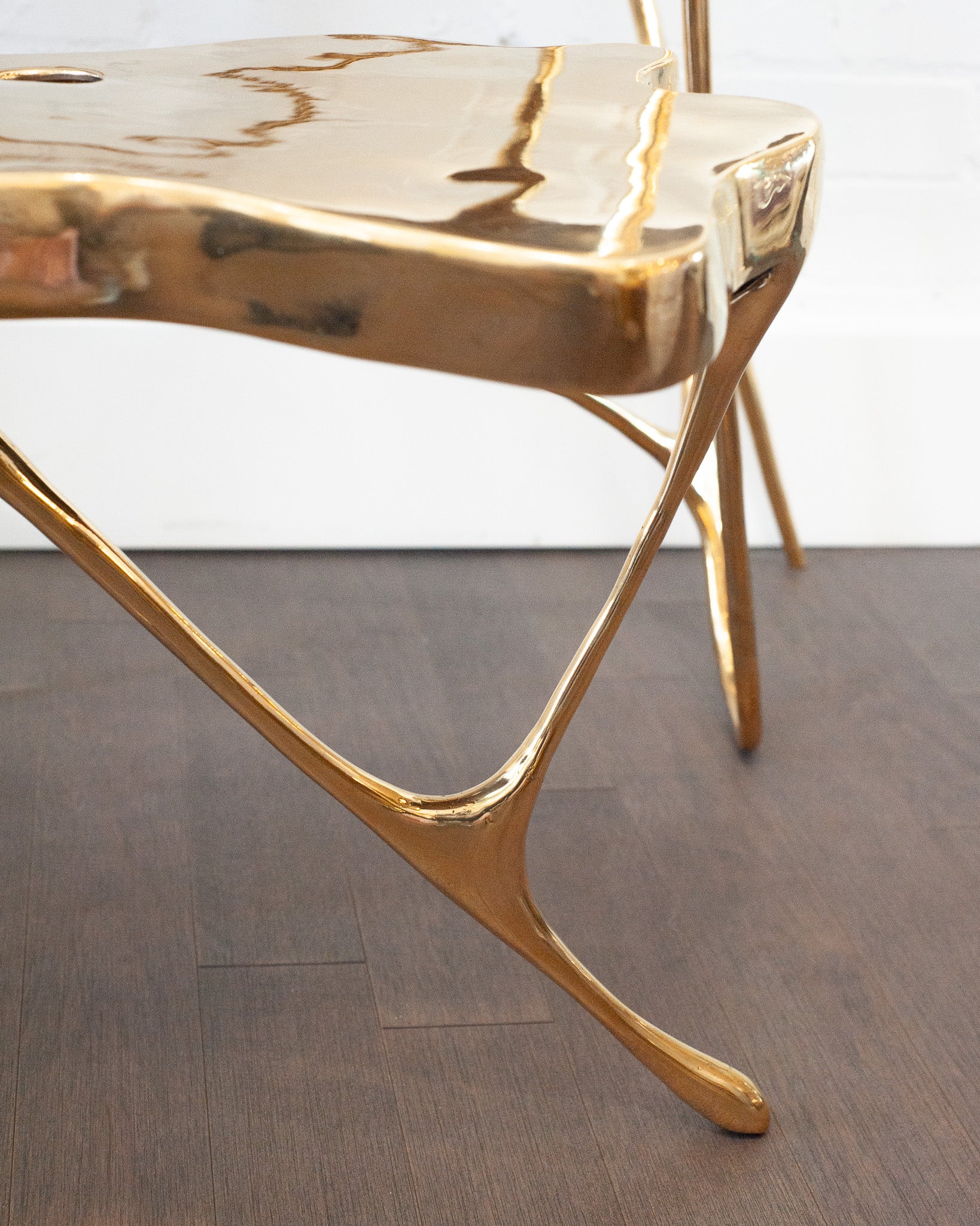 CONTEMPORARY POLISHED CAST BRASS SCULPTURAL SIDE TABLE