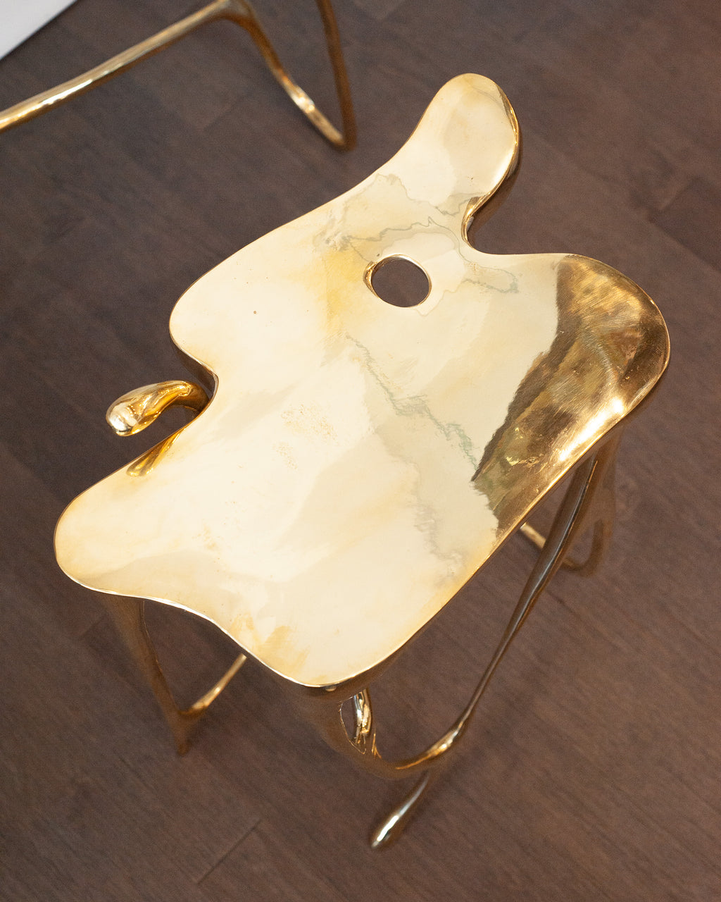CONTEMPORARY POLISHED CAST BRASS SCULPTURAL SIDE TABLE