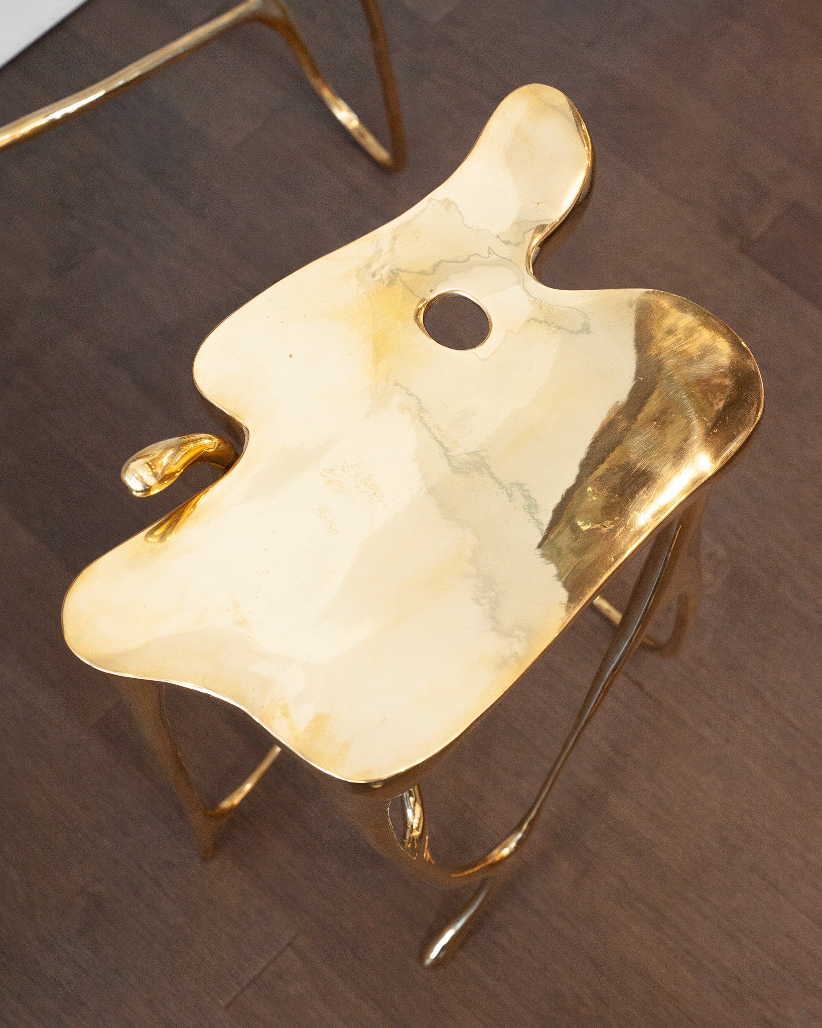 CONTEMPORARY POLISHED CAST BRASS SCULPTURAL SIDE TABLE