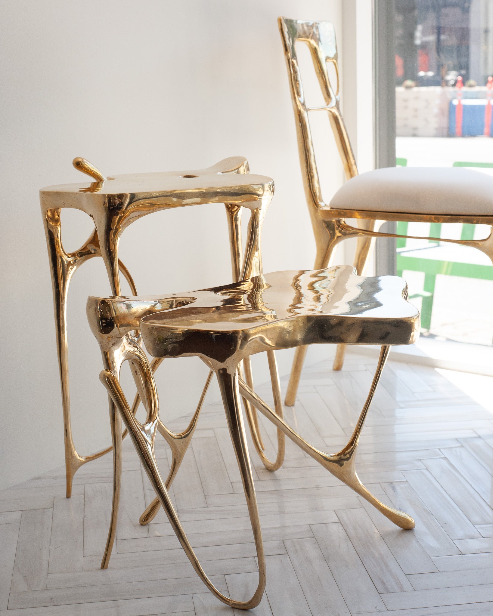 CONTEMPORARY POLISHED CAST BRASS SCULPTURAL SIDE TABLE