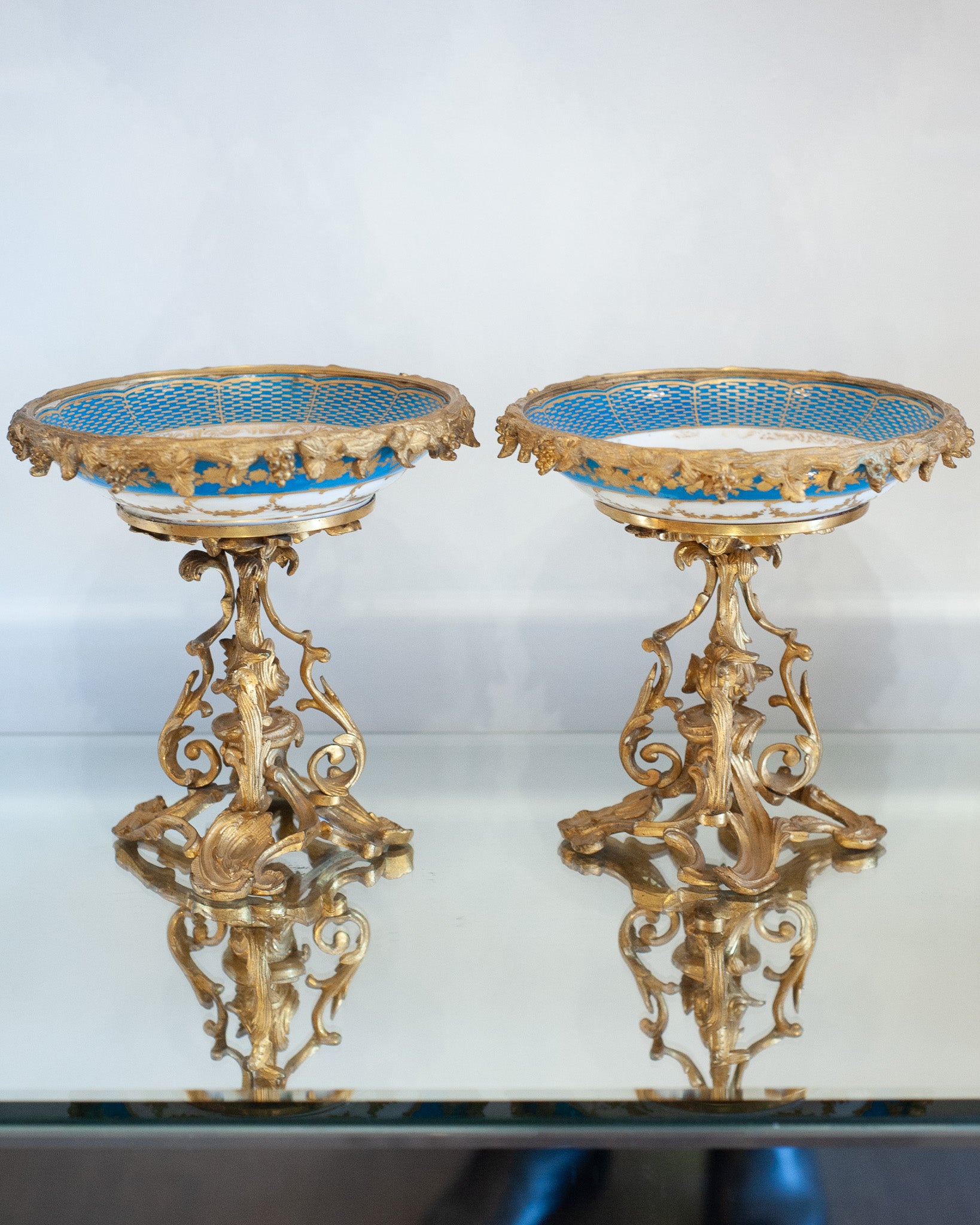 ANTIQUE SÉVRES STYLE PORCELAIN COMPOTES WITH GILT BRONZE FEET
