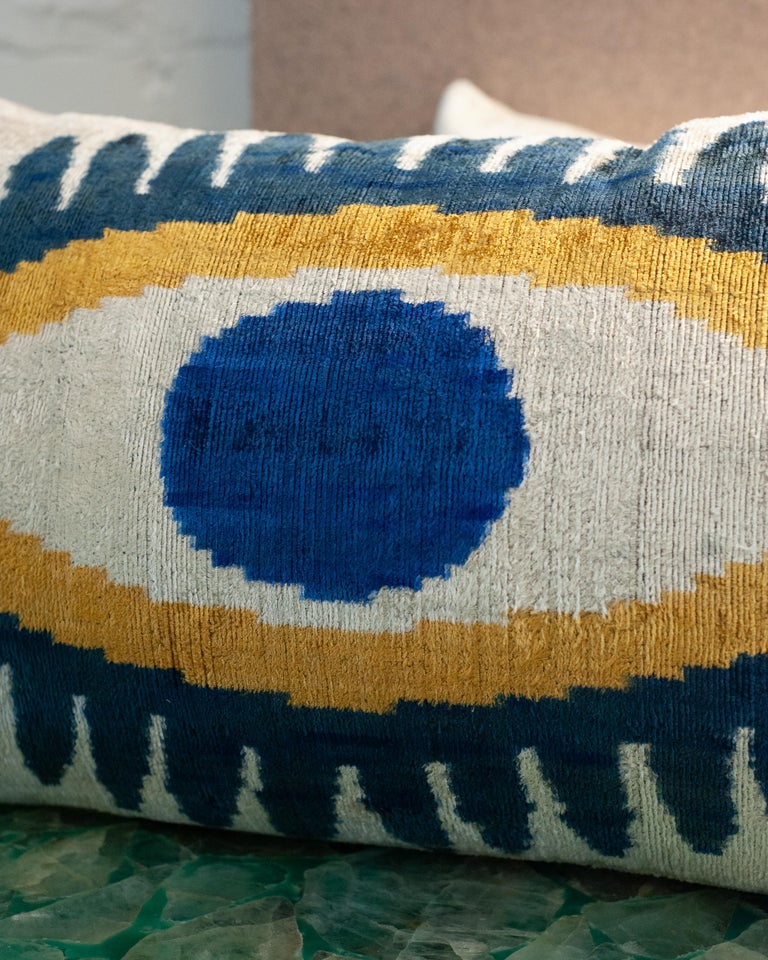 CONTEMPORARY BLUE, YELLOW AND SILVER SILK VELVET PILLOW WITH EVIL EYE MOTIF