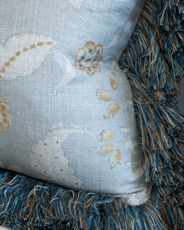 CONTEMPORARY SOFT BLUE & MULTICOLOUR FLORAL LINEN PILLOW WITH LONG BRUSH FRINGE