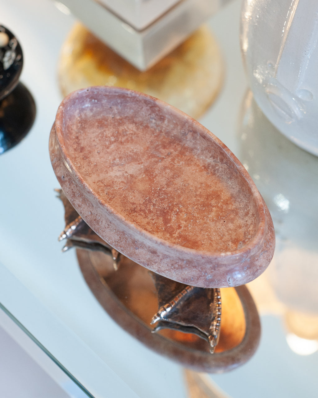 CONTEMPORARY PINK TRAVERTINE DISH WITH CAST BRONZE DUCK FEET