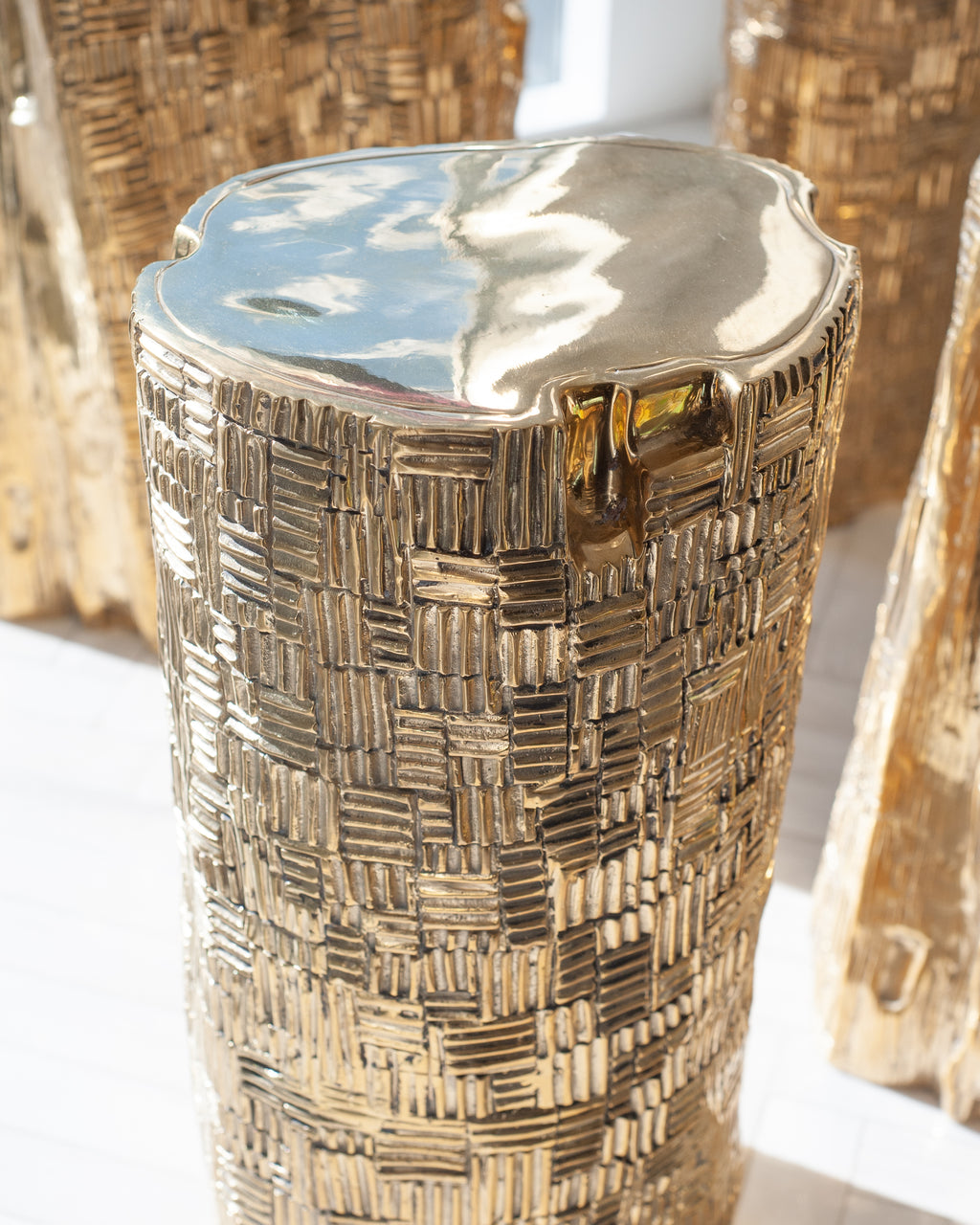 CONTEMPORARY POLISHED AND TEXTURED CAST BRASS SCULPTURAL TALL LOG TABLE