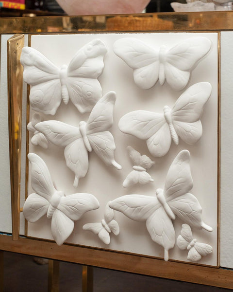 CONTEMPORARY PAIR OF GLASS AND BRASS NIGHTSTANDS WITH MID CENTURY BUTTERFLY PORCELAIN PANELS