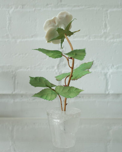 BISCUIT PORCELAIN ROSE IN ROCK CRYSTAL POT