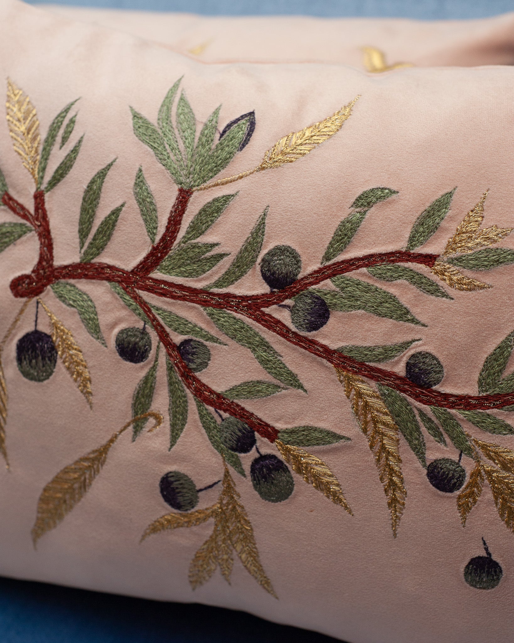 CONTEMPORARY EMBROIDERED PILLOW ON SOFT PINK ULTRASUEDE WITH DOVE & OLIVE BRANCH