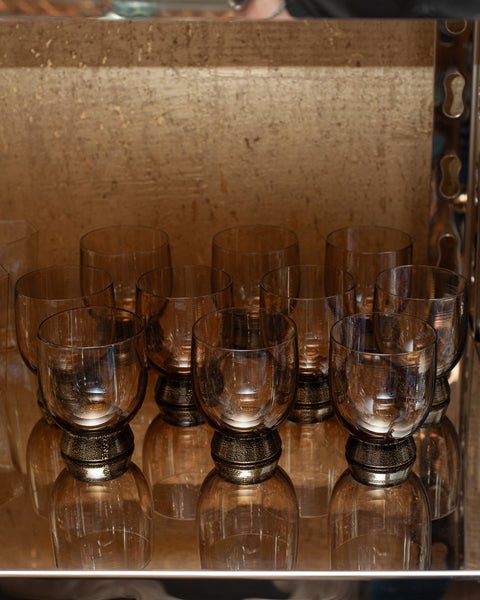 CONTEMPORARY SET OF 10 BELL SHAPED MURANO TUMBLERS IN SMOKE WITH GOLD LEAF BASE