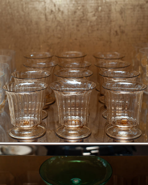 CONTEMPORARY SET OF 12 FLUTED MURANO GLASS TUMBLERS IN SOFT AMBER