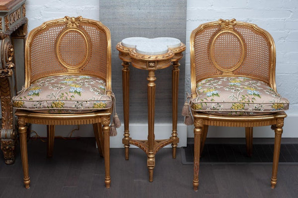 ANTIQUE PAIR OF FRENCH GILDED CHAIRS WITH CANE WEBBING AND UPHOLSTERED CUSHIONS