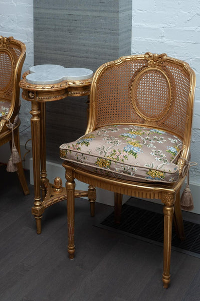 ANTIQUE PAIR OF FRENCH GILDED CHAIRS WITH CANE WEBBING AND UPHOLSTERED CUSHIONS