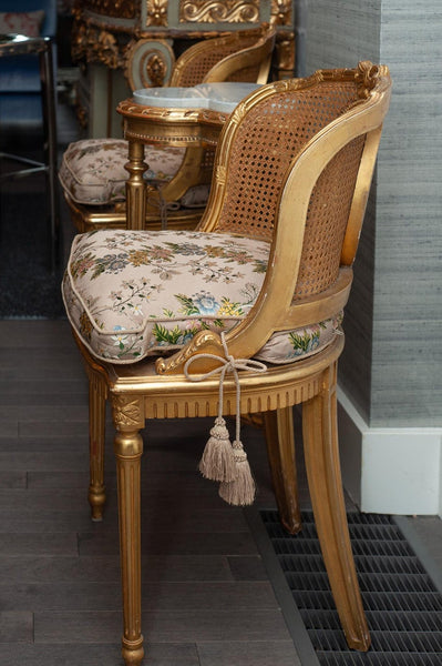 ANTIQUE PAIR OF FRENCH GILDED CHAIRS WITH CANE WEBBING AND UPHOLSTERED CUSHIONS