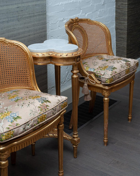 ANTIQUE PAIR OF FRENCH GILDED CHAIRS WITH CANE WEBBING AND UPHOLSTERED CUSHIONS