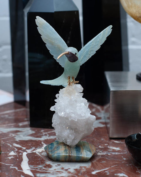 AQUAMARINE HUMMINGBIRD SCULPTURE ON ROCK CRYSTAL AND BLUE ONYX MINERAL BASE