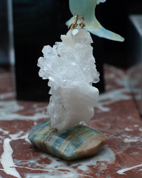 AQUAMARINE HUMMINGBIRD SCULPTURE ON ROCK CRYSTAL AND BLUE ONYX MINERAL BASE